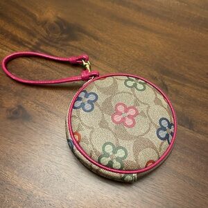 Floral Patterned Round Wristlet